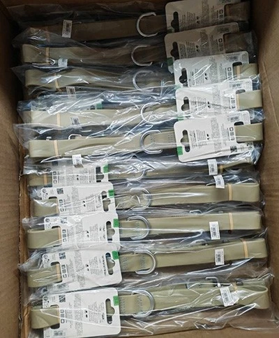 Dog collars and leashes arranged in individual packaging for wholesale distribution Dog collars and leashes arranged in individual packaging for wholesale distribution