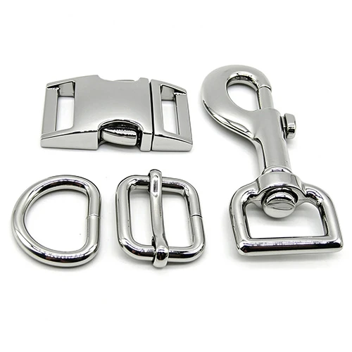 Inspecting buckle and D-ring finish on a custom dog collar Inspecting buckle and D-ring finish on a custom dog collar